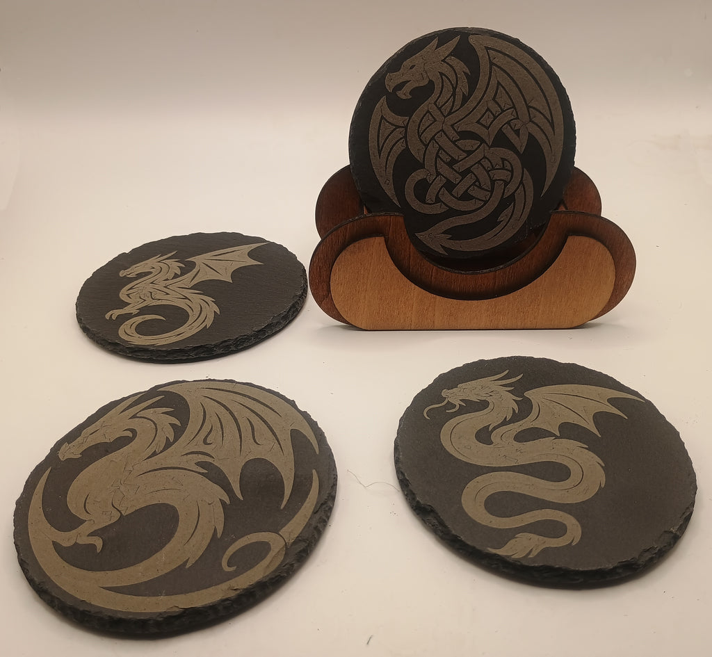 Four dragon-themed coasters with a wooden stand on a white background