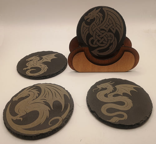Four dragon-themed coasters with a wooden stand on a white background