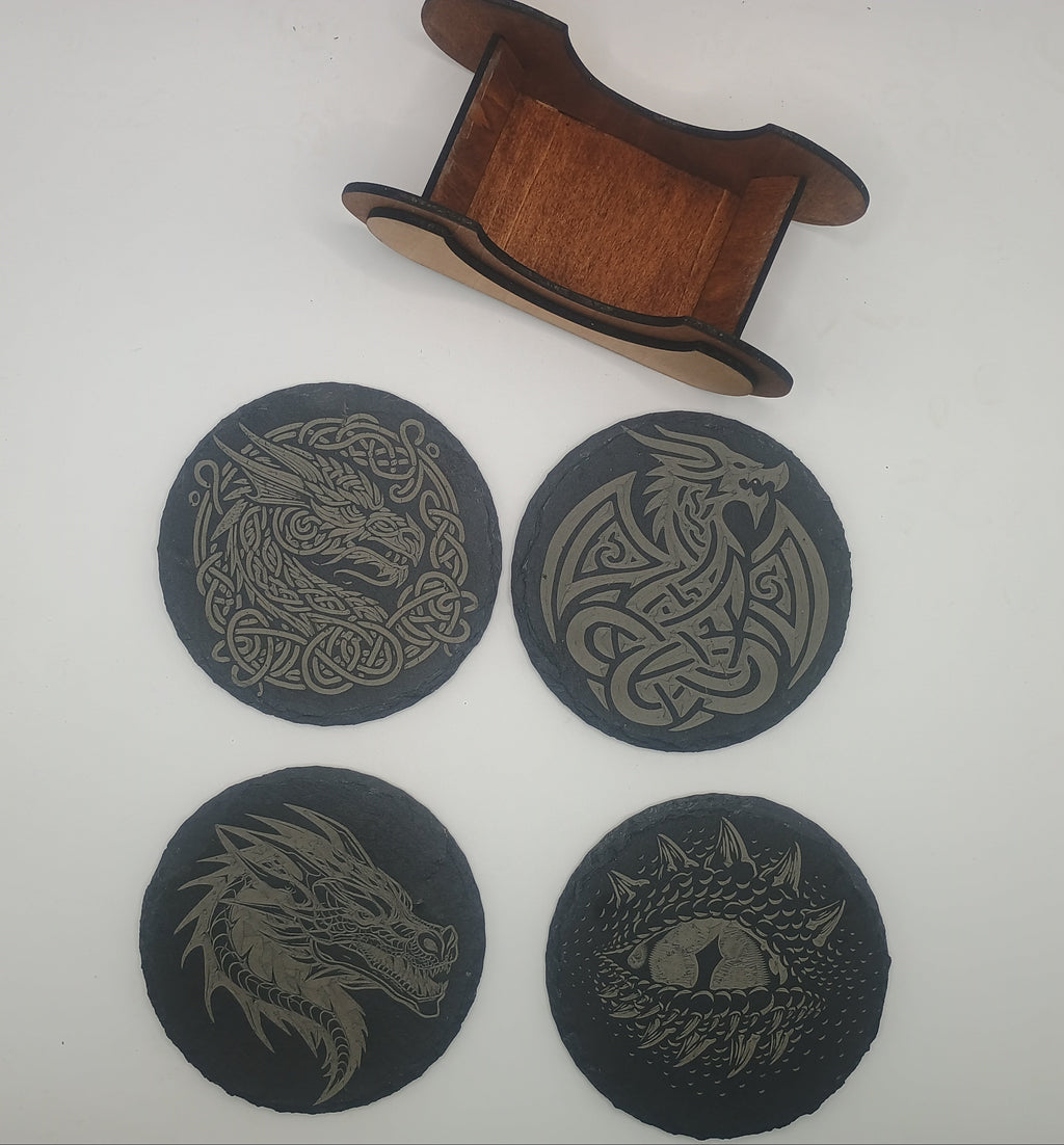 Four dragon-themed coasters with a wooden coaster holder.