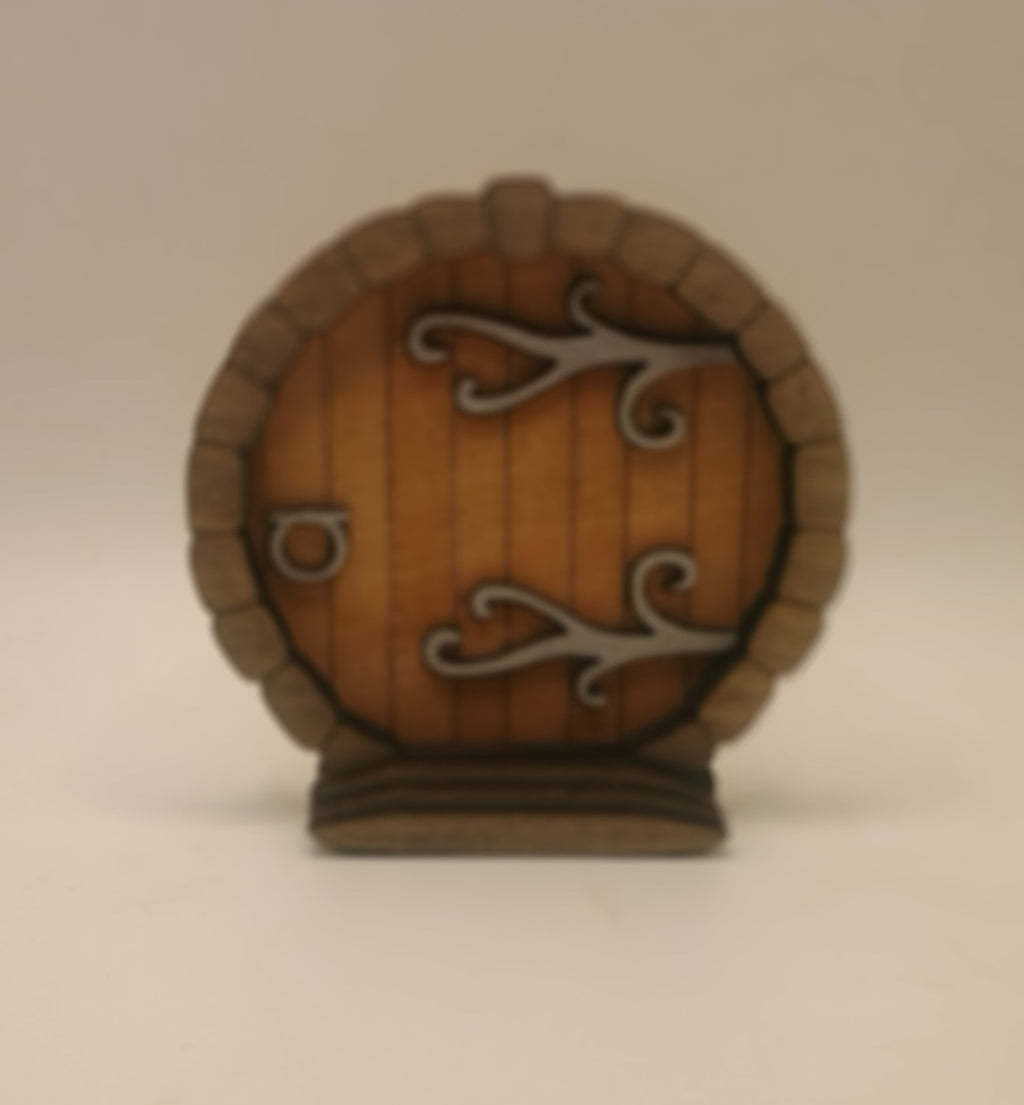 Small round door with metal accents
