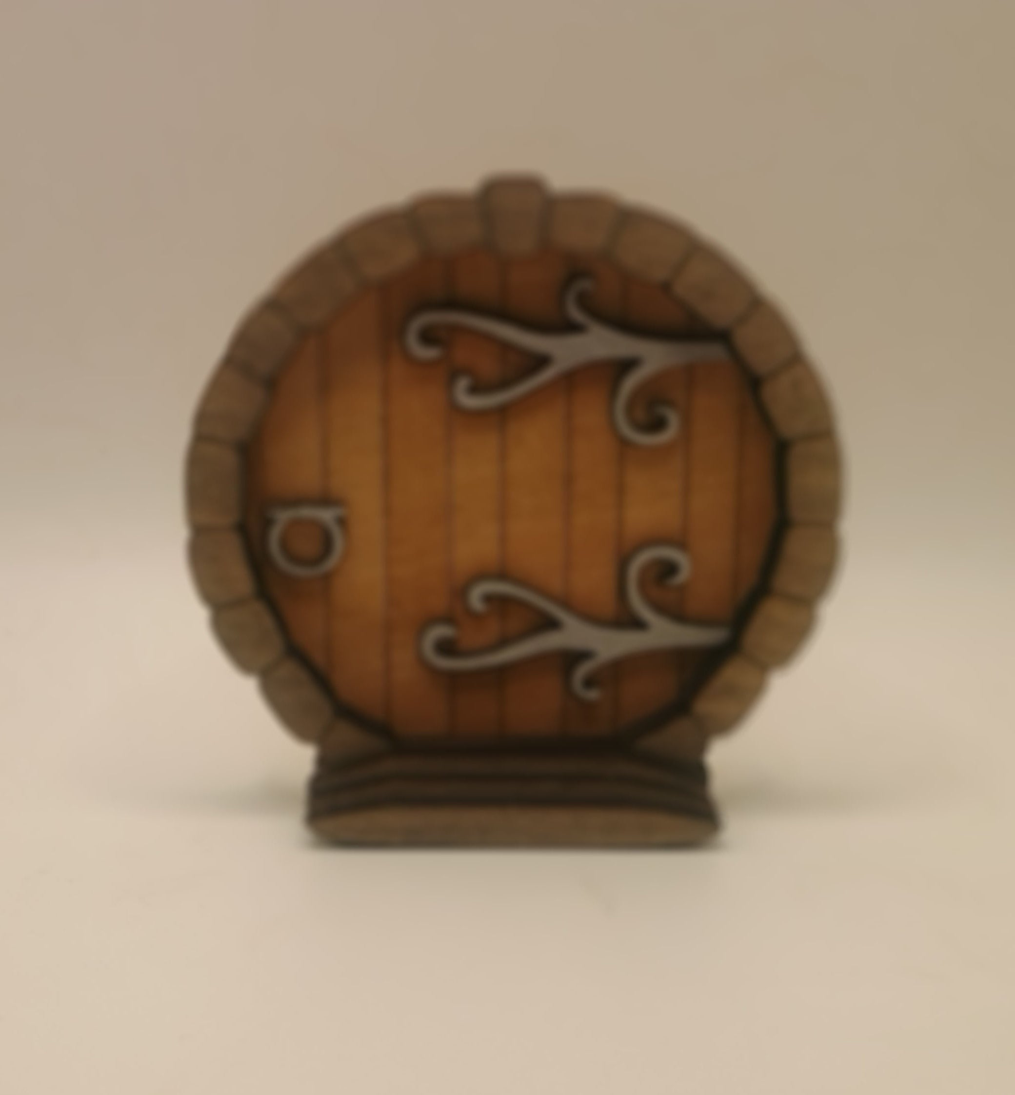 Small round door with metal accents