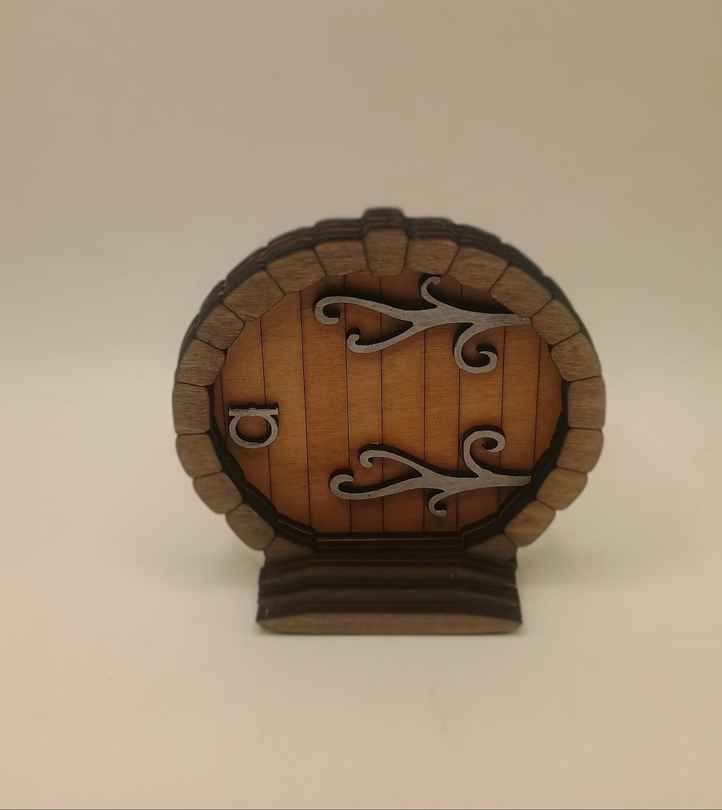 Small round door with metal accents
