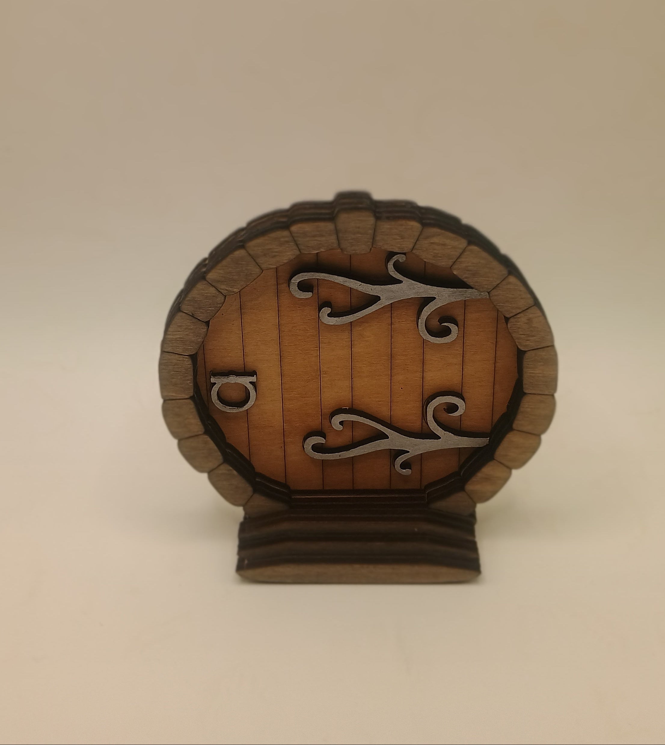 Small round door with metal accents