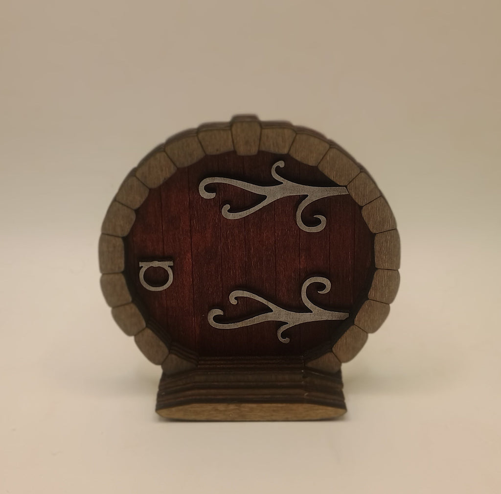 Small round door with metal accents