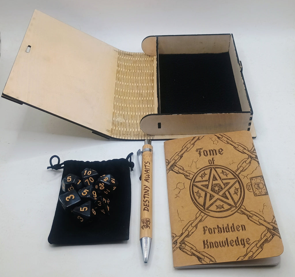 A wooden-themed Dungeons and Dragons set including a wooden tome notebook, a wooden pen, a black velvet pouch with black polyhedral dice, and an open wooden box with a black interior, arranged on a white surface.